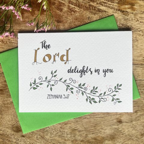The Lord delights in you, bible verse card.